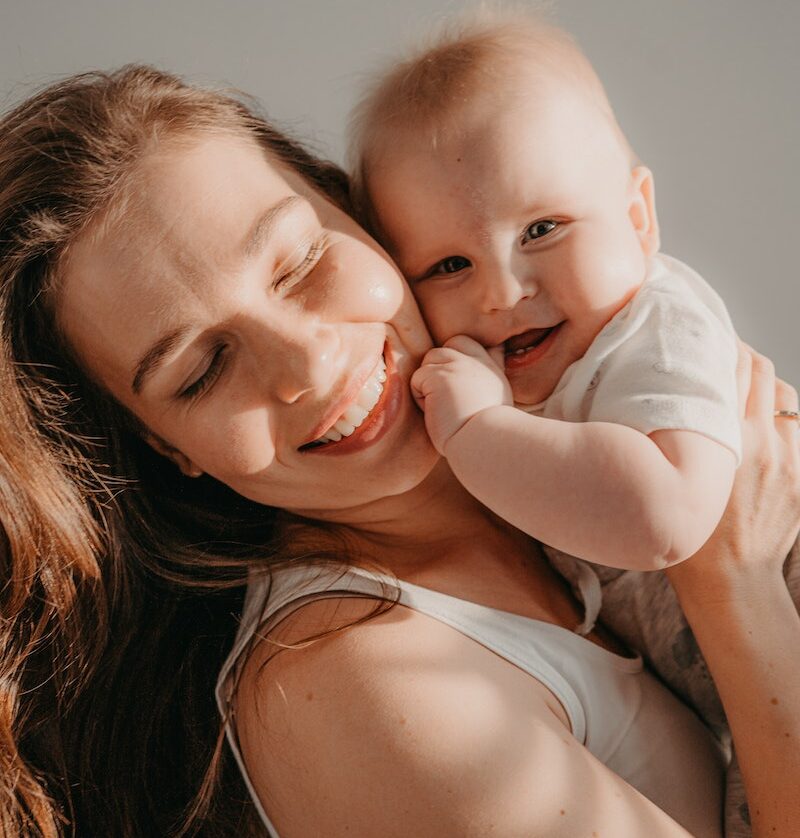 Mother Hugging her Baby